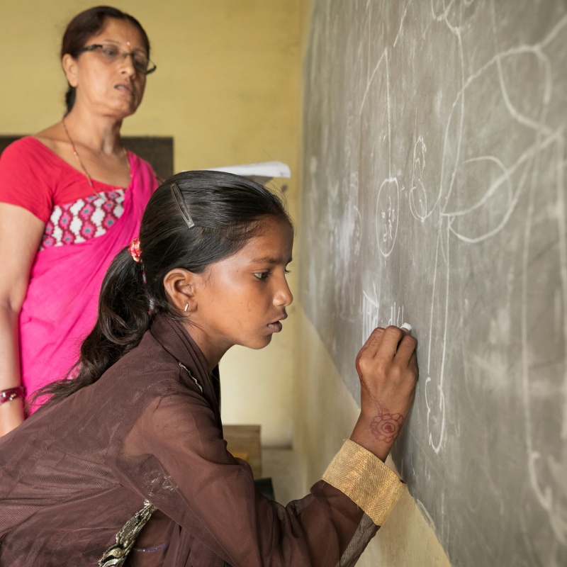 Barsha Kumari Pashawal in her (class five) classroom at Shree Ram Narayan Ayodhaya School, Pipra rural municipality, Mahottari District, Ward 4, Nepal.