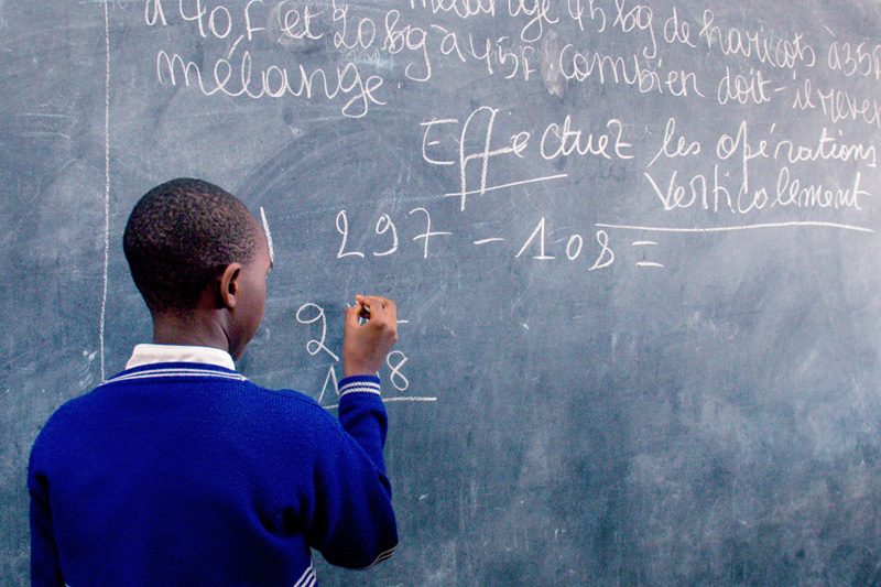 A student solving a math problem at Kigobe Reference Center for Inclusive Education. Credit: GPE/Ingomag