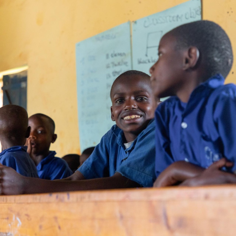 Learning in an inclusive program alongside other children has helped Hodari, 14, overcome his disability and learn to read. Credit: UNICEF/UNI312712/Houser