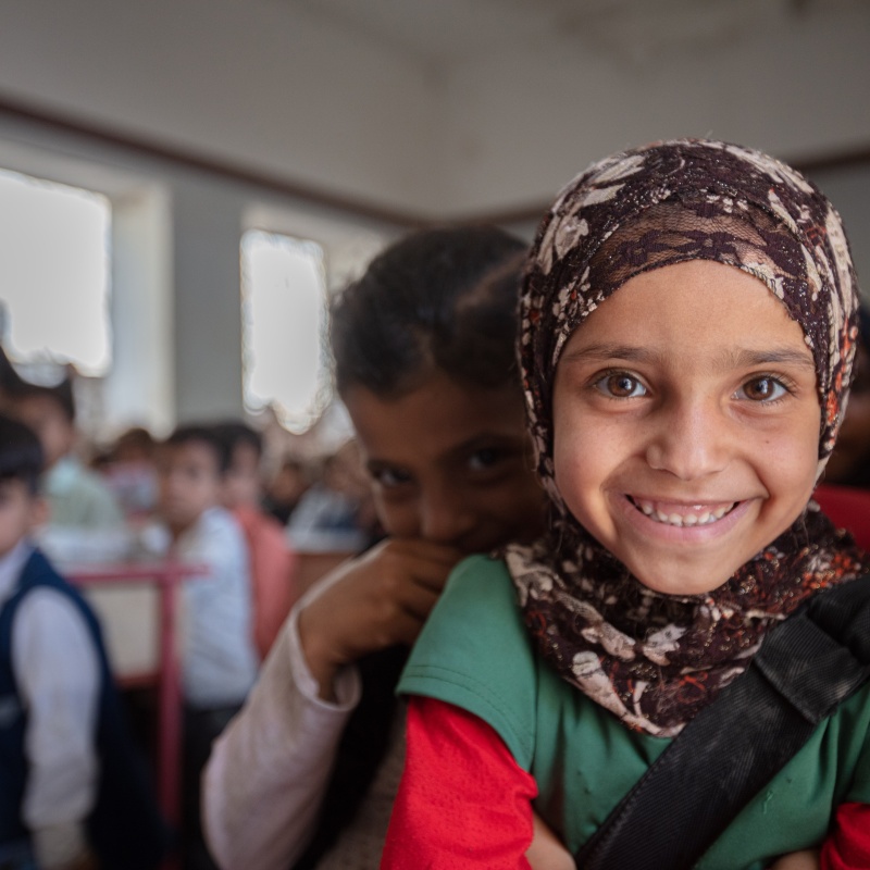 First grader at Al-Hamzi school, smiling to the camera, Hajjah, March 2021. Credit: UNICEF/UN0459559/Marish